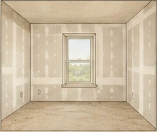 Room with new wall panels prepared during broad repair work